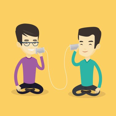 Teneke telefon aracılığıyla konuşan genç arkadaşlar.