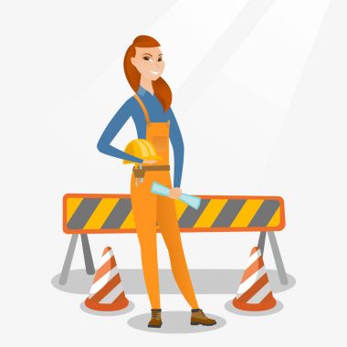 Kask ile mühendis ve blueprint.