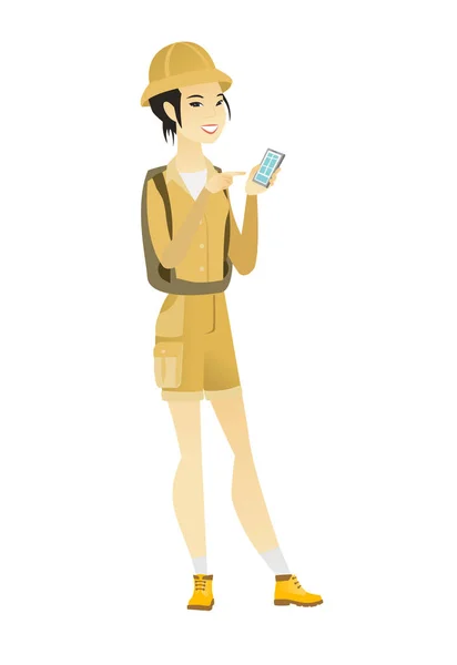 Voyageur asiatique tenant un téléphone mobile . — Image vectorielle