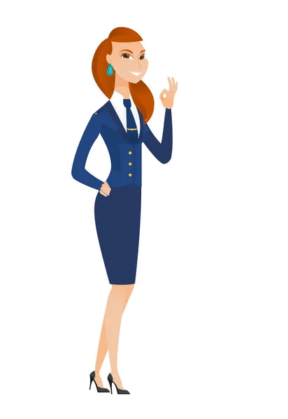 Smiling stewardess showing ok sign. — Stock Vector