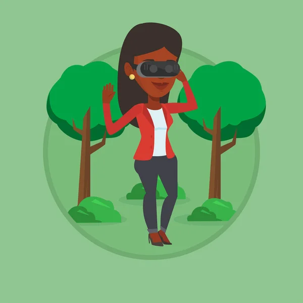 Γυναίκα που φοράει το σετ κεφαλής εικονικής πραγματικότητας στο πάρκο. — Διανυσματικό Αρχείο