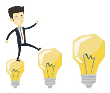 İş adamı ampulleri üzerinde atlama.