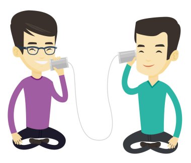 Teneke telefon aracılığıyla konuşan genç arkadaşlar.