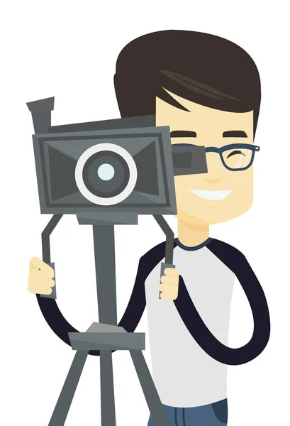 Оператор с кинокамерой на штативе . — стоковый вектор