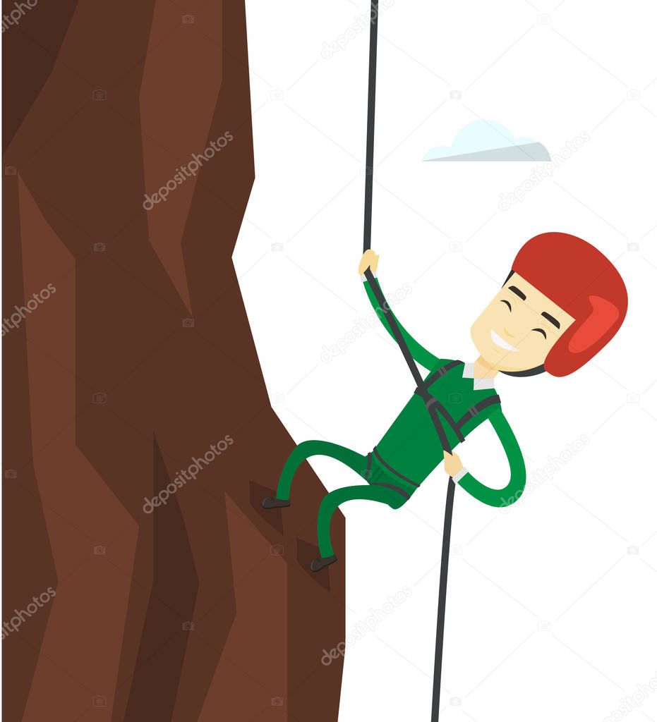 Man climbing in mountains with rope.