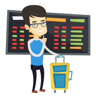 Havaalanında uçuş için bekleyen genç adam.