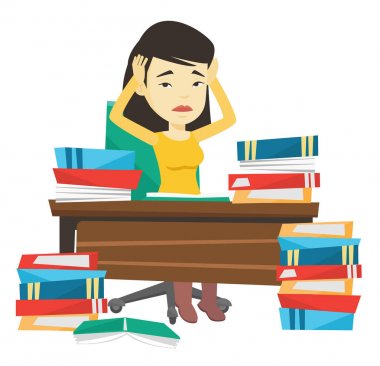 Kitap yığınları ile masadan öğrenci.