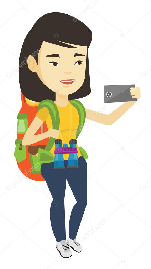 Woman with backpack making selfie.