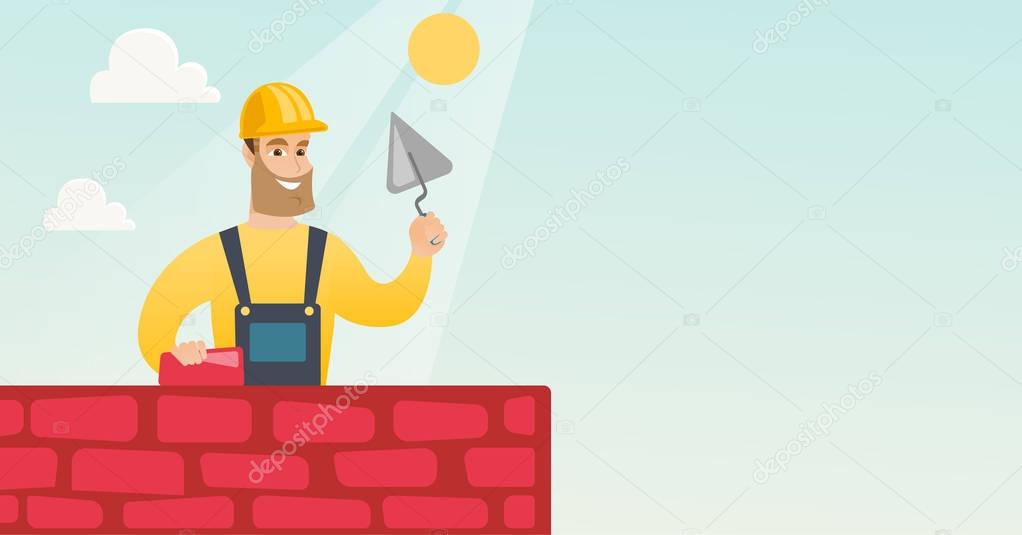 Bricklayer working with spatula and brick.
