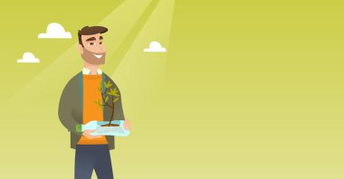 Plastik şişede büyüyen bitki tutan adam.