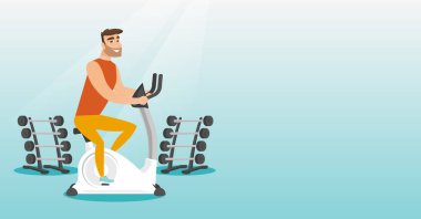 Genç adam sürme sabit Bisiklet.