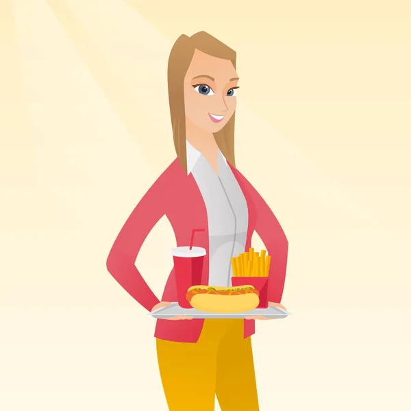 Frau hält Tablett voller Fast Food in der Hand. — Stockvektor