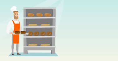 Mutlu genç baker ekmek ile bir tepsi tutarak.