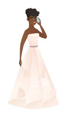 Bir cep telefonu üzerinde konuşurken nişanlısı.