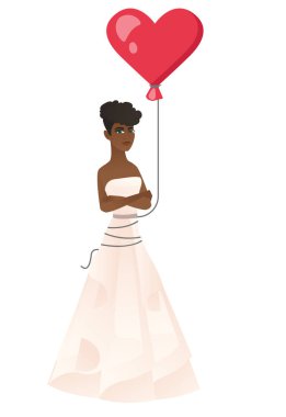 Ciddi bir kalp şeklindeki kırmızı balon gelinle.