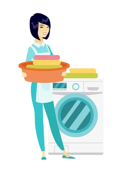 Hospodyňka použití pračky na praní prádla. — Stockový vektor