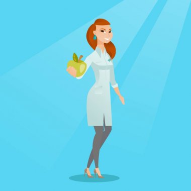 Beslenme uzmanı sunan taze elma.