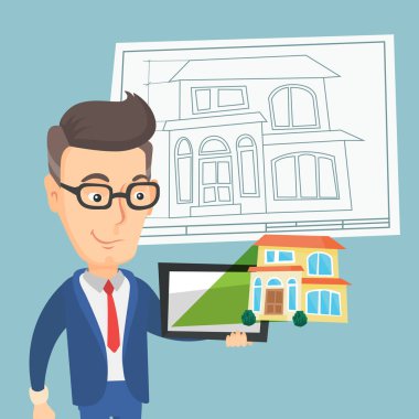 Adam bir ev fotoğraf bir tablet bilgisayarda gösterme.