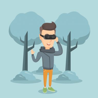 Sanal gerçeklik kulaklık parkta giyen adam.