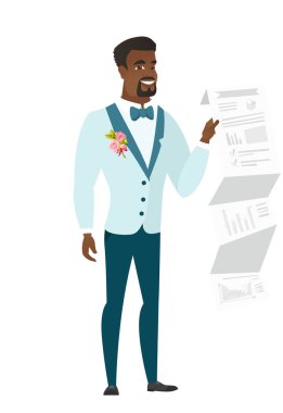 Bir belge sunumu ile gösterilen damat.