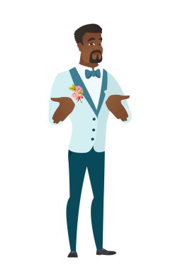 Omuzlarında shrugging Afrika şaşkın damat.