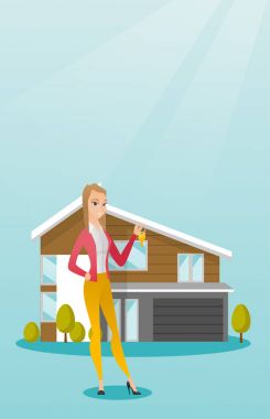 Genç beyaz ev sahibi ile anahtar.