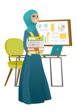 Klasörleri yığını tutan Müslüman iş kadın.