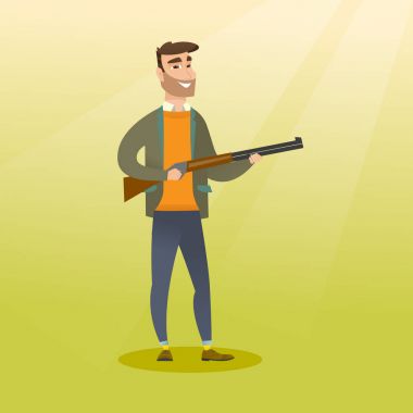 Bir av tüfeği tutan genç beyaz avcı.