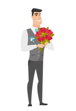 Bir buket çiçek tutan beyaz damat