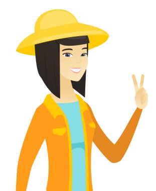 Zafer jest gösterilen genç Asyalı çiftçi.