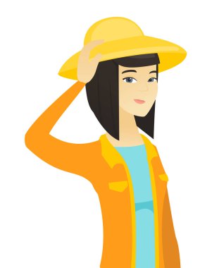 Genç Asyalı çiftçi başını tırmalamak.