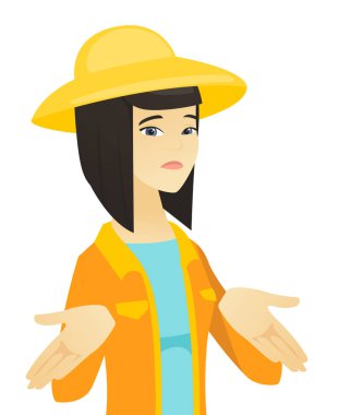 Genç Asyalı çiftçi omuzlarında shrugging karıştı.