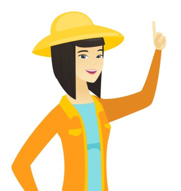 Genç Asyalı çiftçi onun işaret parmağı ile işaret.