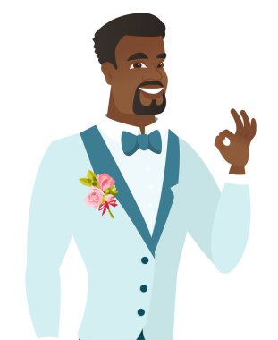Ok işaret gösteren genç Afro-Amerikan damat.
