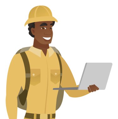 Dizüstü bilgisayar kullanan genç Afro-Amerikan Gezgin.