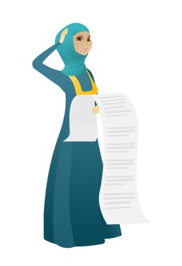 Uzun bir fatura tutan Müslüman muhasebeci.