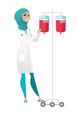 Müslüman doktor hazırlanıyor damla sayacı.