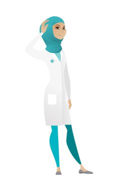 Genç Müslüman doktor başını tırmalamak.