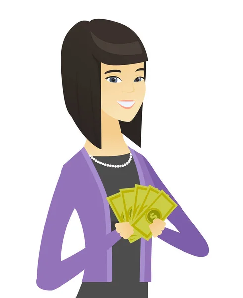 Щаслива азіатська бізнес-леді тримає гроші . — стоковий вектор