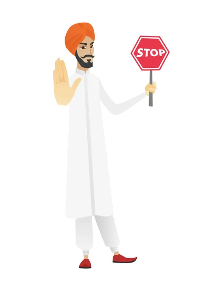 Hindu businessman holding stop road sign. — Stock Vector