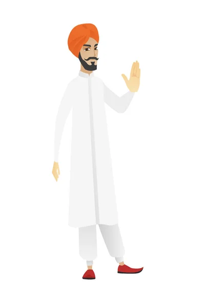 Hombre de negocios hindú mostrando palma de la mano . — Vector de stock