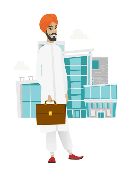 Hombre de negocios hindú sosteniendo maletín . — Vector de stock