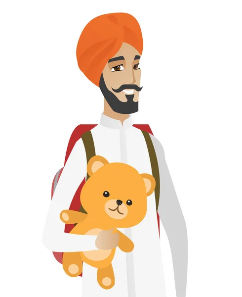 Hombre viajero hindú sosteniendo oso de peluche . — Vector de stock