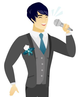 Genç Asyalı damat mikrofon şarkı.