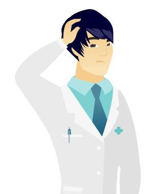 Genç Asyalı şaşkın doktor başını tırmalamak.