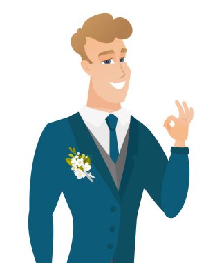 Ok işaret gösteren genç beyaz damat.