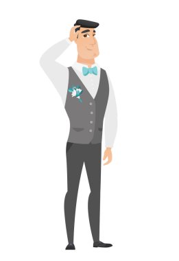 Genç beyaz damat başını tırmalamak.