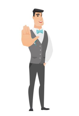 Palm el gösterilen beyaz damat.