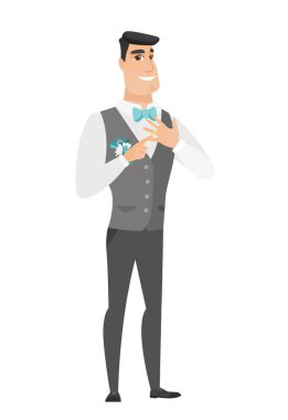 Neşeli damat altın yüzük parmağı üzerinde gösterilen.