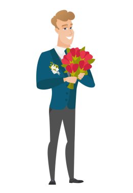 Bir buket çiçek tutan beyaz damat